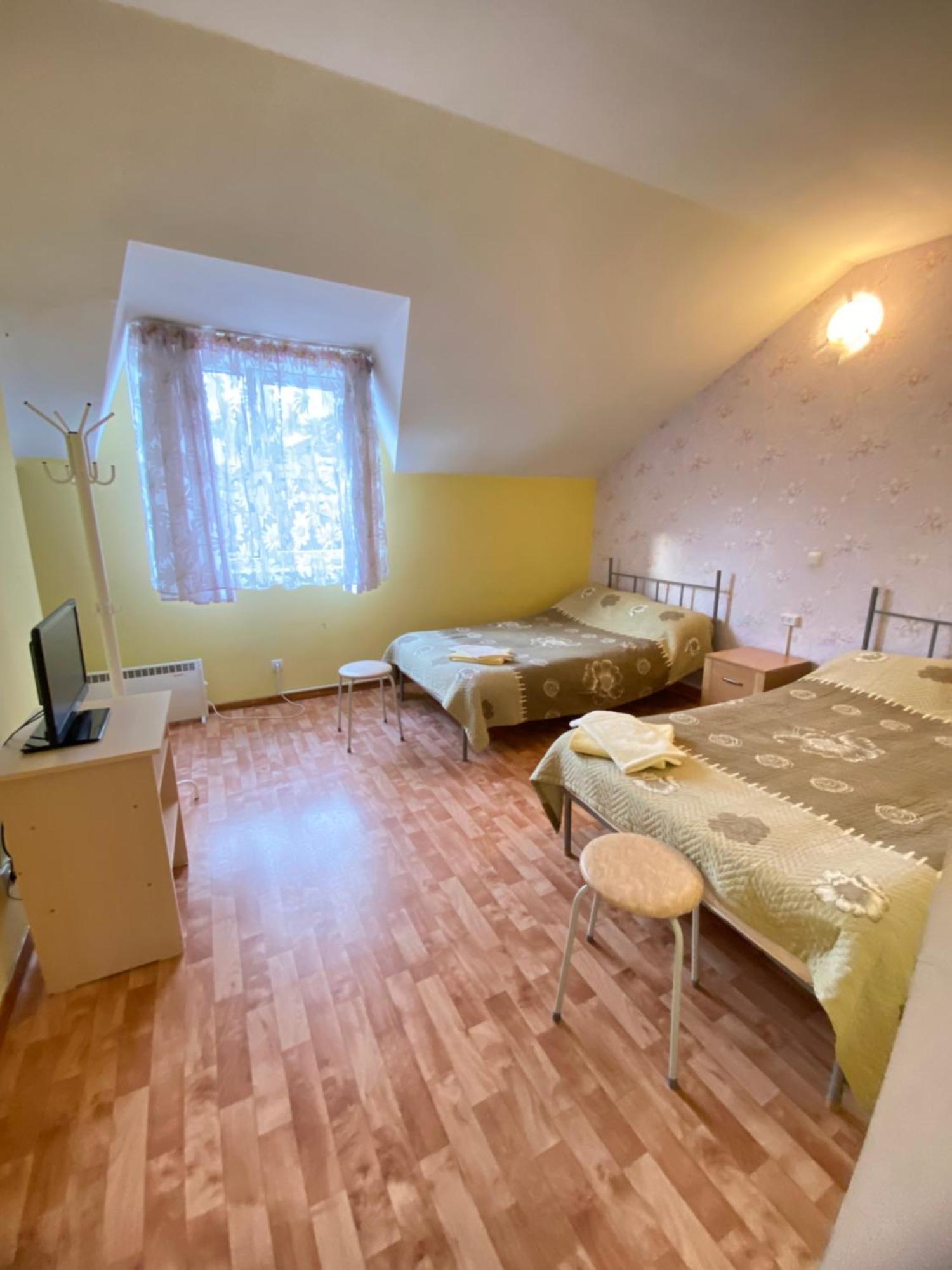 Osobyi Guest House Tsjolpon-Ata Eksteriør bilde